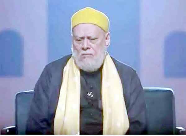 بزرگ سیاستدان، روایتی لباس میں، سنجیدہ انداز میں گفتگو.