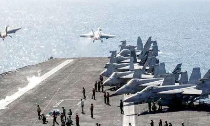 ایرانی فوجی اور فوجی طیارے امریکی بحری جہاز کے قریب، کشتیوں اور فوجی عملے کے ساتھ، مشرق وسطیٰ میں کش.