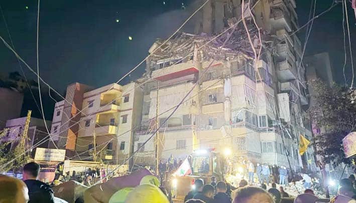 اسرائیل کے لبنان پر حملے کی تصویر، عمارت تباہ، شہریوں کی ہنگامی صورتحال.