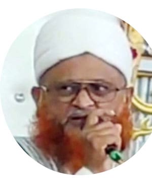 مشہور شخصیت کی تصویر، سرخ داڑھی اور عینک کے ساتھ.