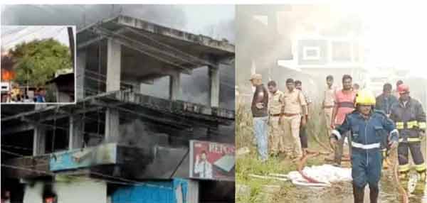 آگ لگنے کے واقعہ میں فائر فائٹرز اور لوگ موجود ہیں.
