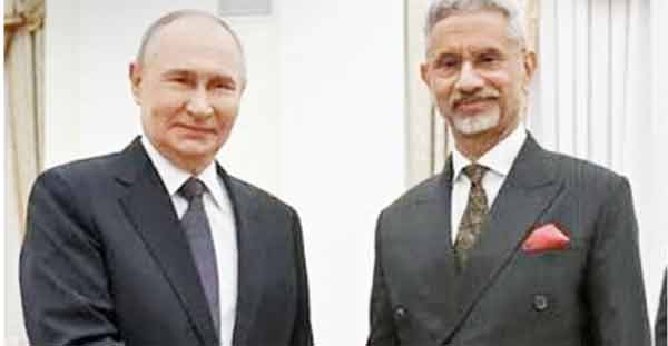 پیوٹن اور بھارتی وزیر خارجہ کی ملاقات کی تصویر.