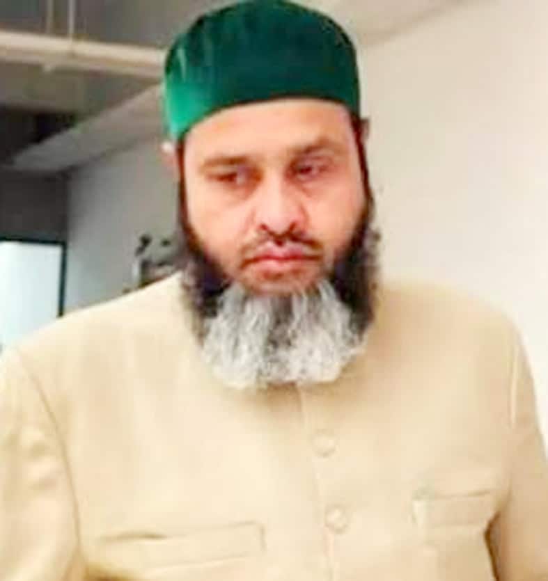 مذہبی رہنما کا سر اور داڑھی کے ساتھ تصویر.