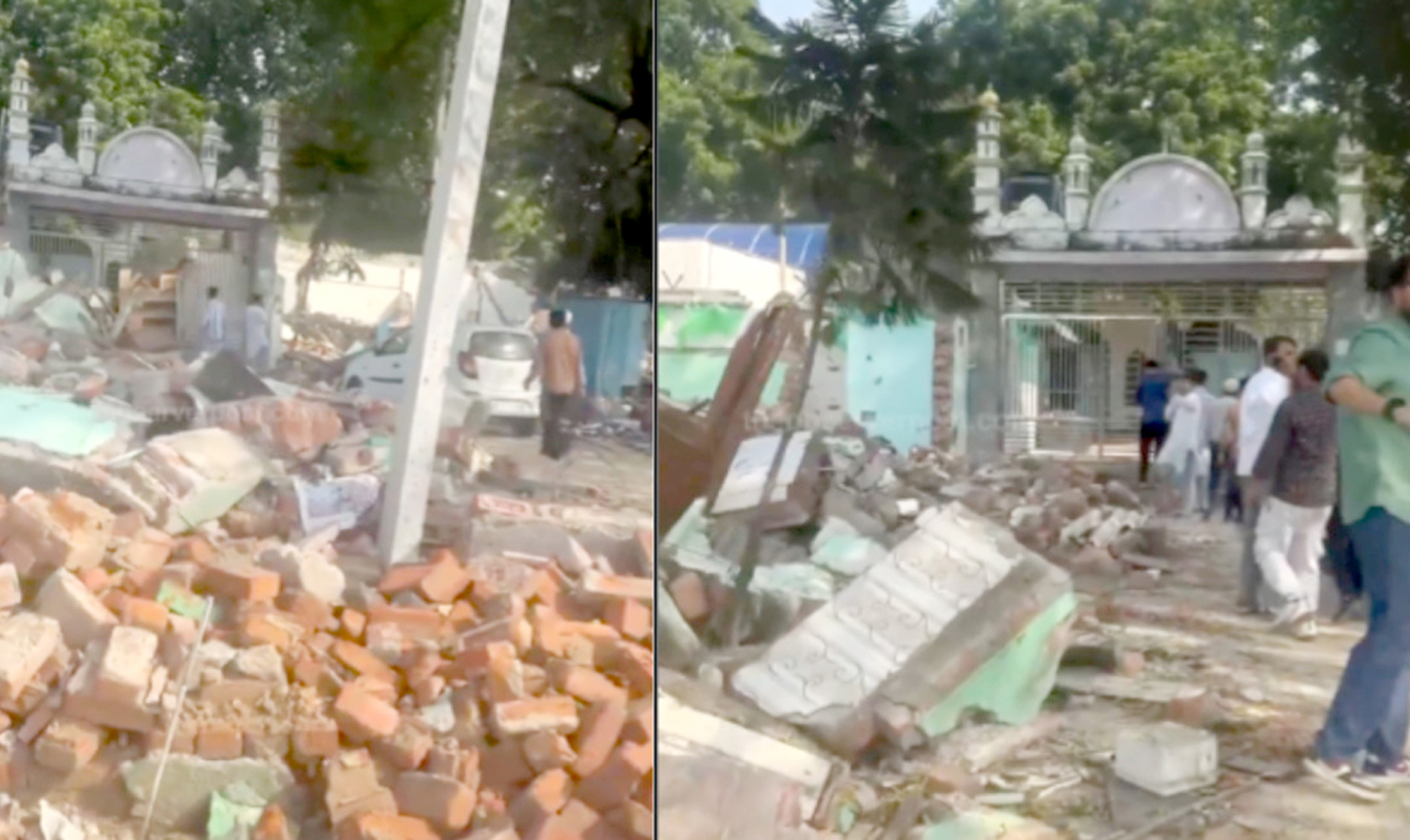 مقبرہ کے باہر تباہی، ملبہ اور لوگ حادثہ کی جگہ پر موجود.
